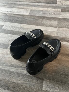 No Boundaries Black Lug Sole Loafers with Silver Chain
